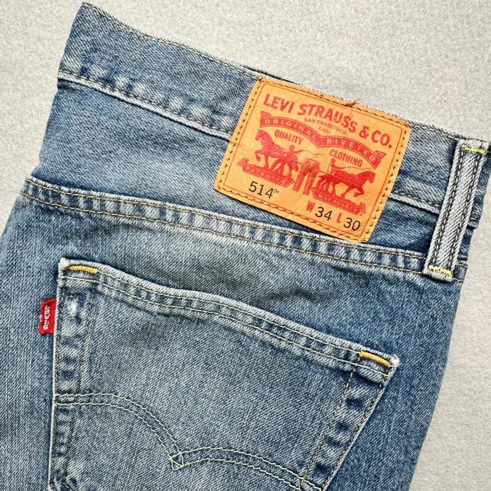 Levi's 514 Straight Fit Jeans Mens 34x30 Blue Distressed Ripped Denim 00514-0881